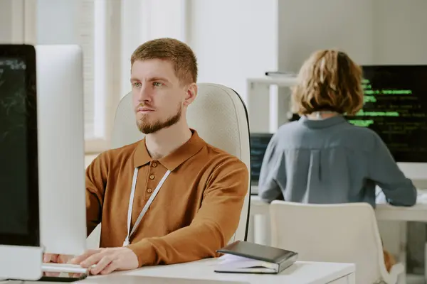 bearded-man-working-on-computer-(1)