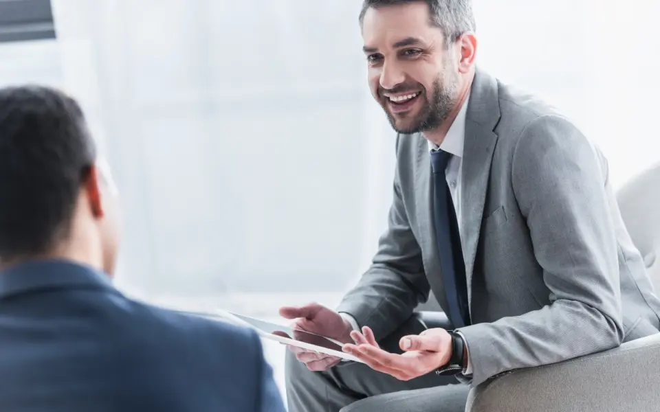 smiling-young-businessman-holding-digital-tablet-a-2024-11-18-04-50-52-utc