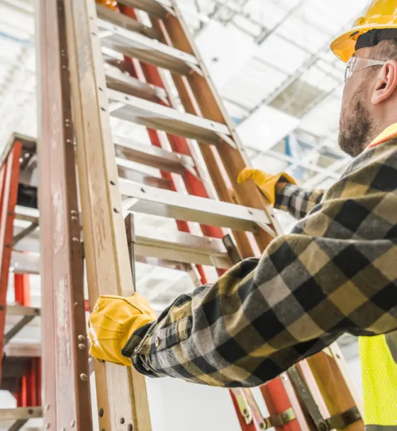 worker-taking-a-ladder-to-work-a(1)