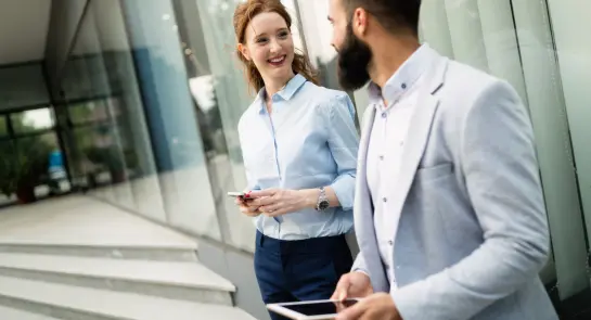 business-colleagues-on-city-streets-smiling-worki-2021-08-26-17-34-04-utc