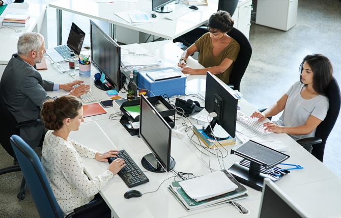 shot-of-a-group-of-coworkers-sit