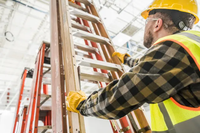 worker-taking-a-ladder-to-work-a(1)