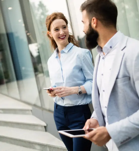 business-colleagues-on-city-streets-smiling-worki-2021-08-26-17-34-04-utc