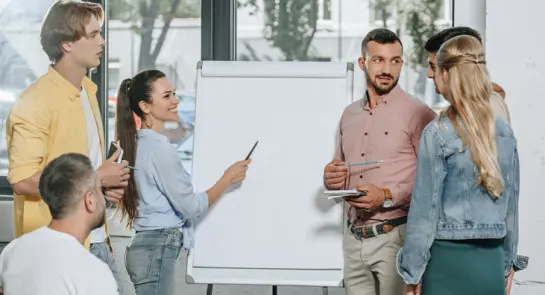 young-businesspeople-standing-ne